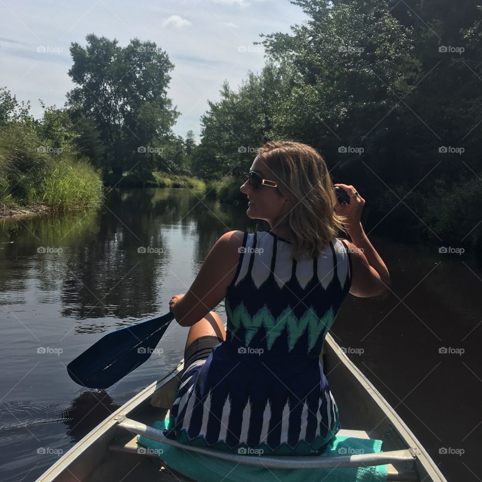 Woman boating in lake