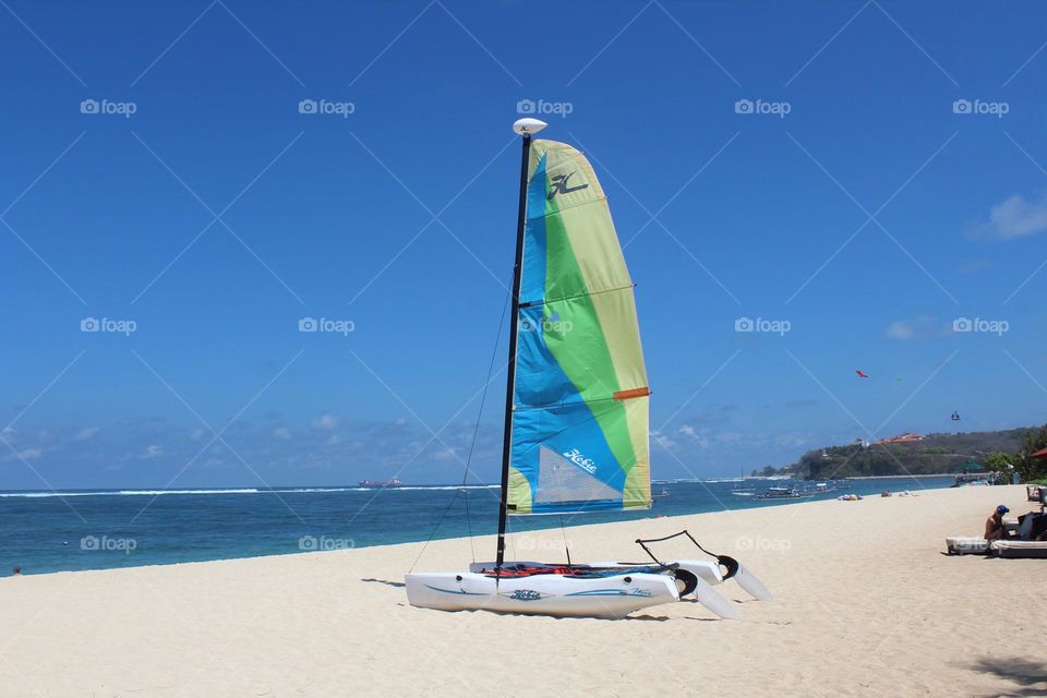 Wind surfing and chilling lifestyle somewhere in Bali.