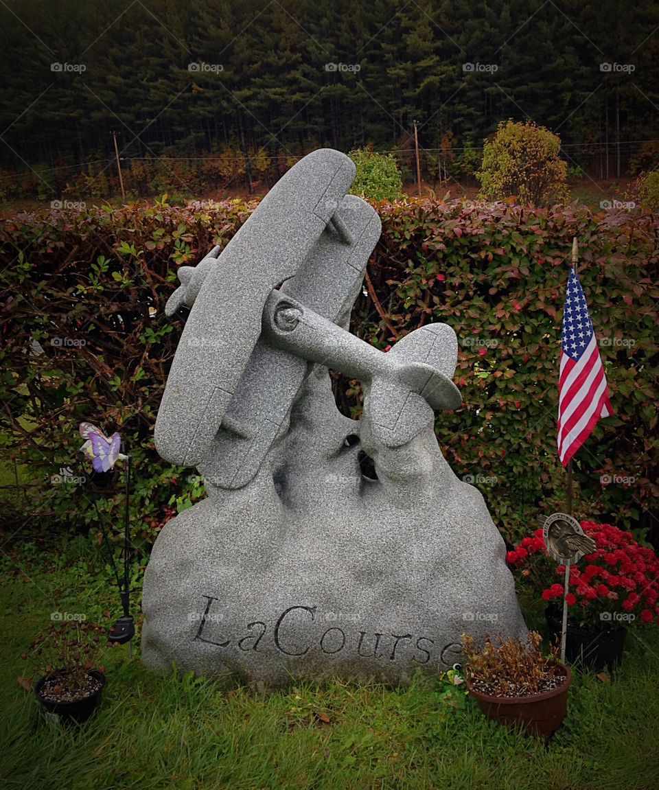 Fly away. Have you ever seen a headstone in the shape of a plane? 