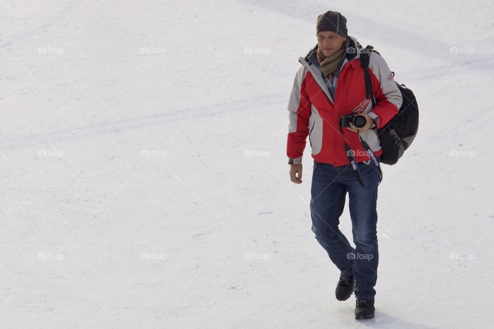 Photographer on ice rink