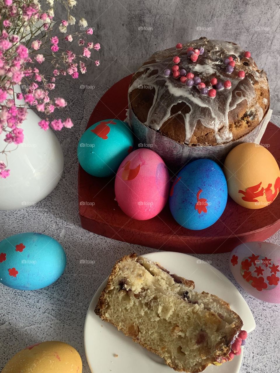 Easter traditionally colored eggs and cake