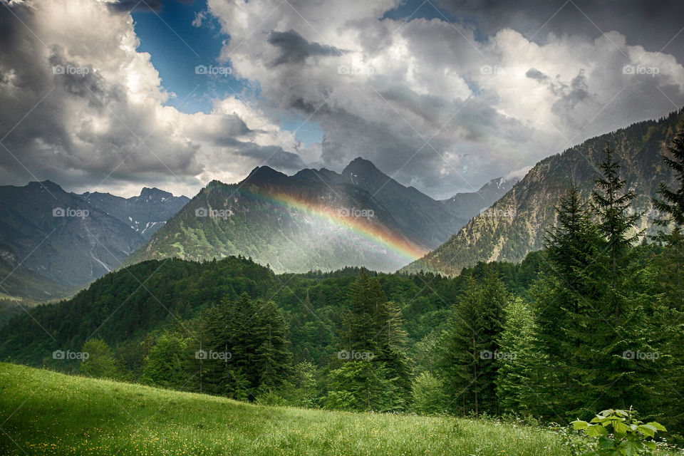 Rainbow at mountain during winter