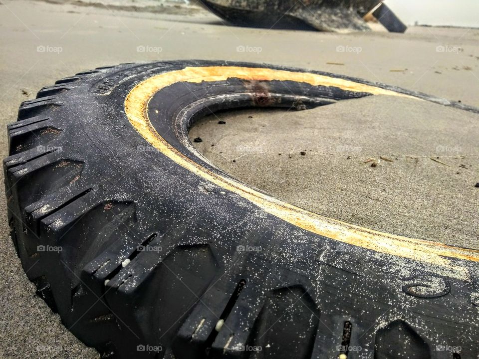 Tire on beach