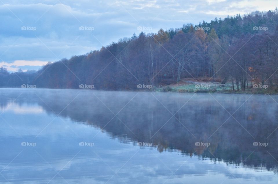 foggy morning over the lake in poland