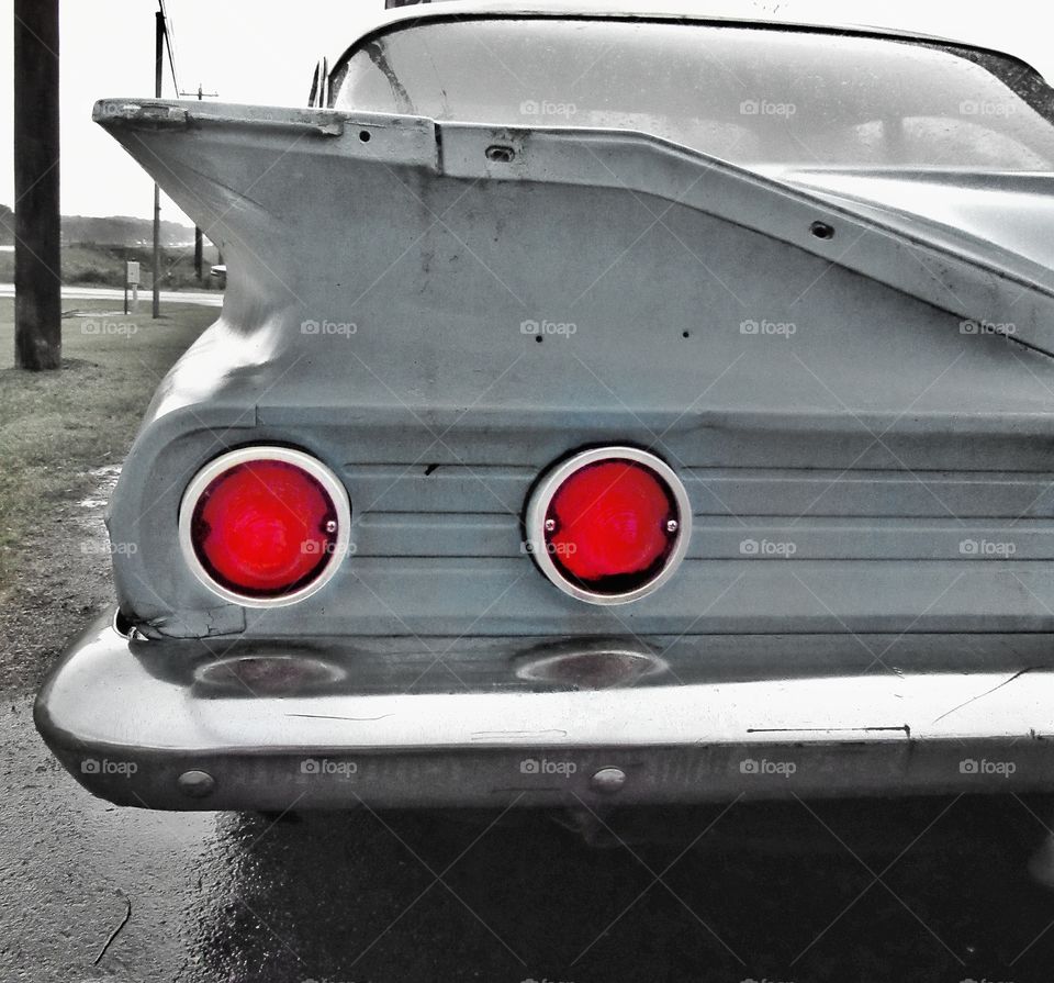 splash of color back of vintage car