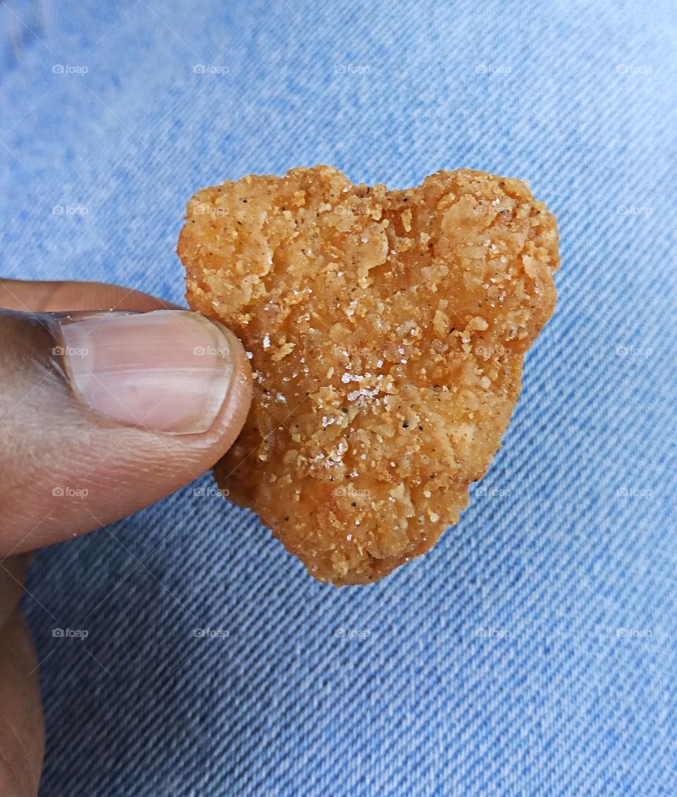 lunch time, a heart shaped chicken tender.