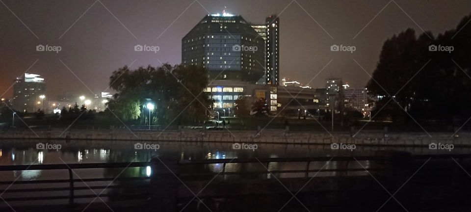 night city wiev beautiful lights and reflection in river