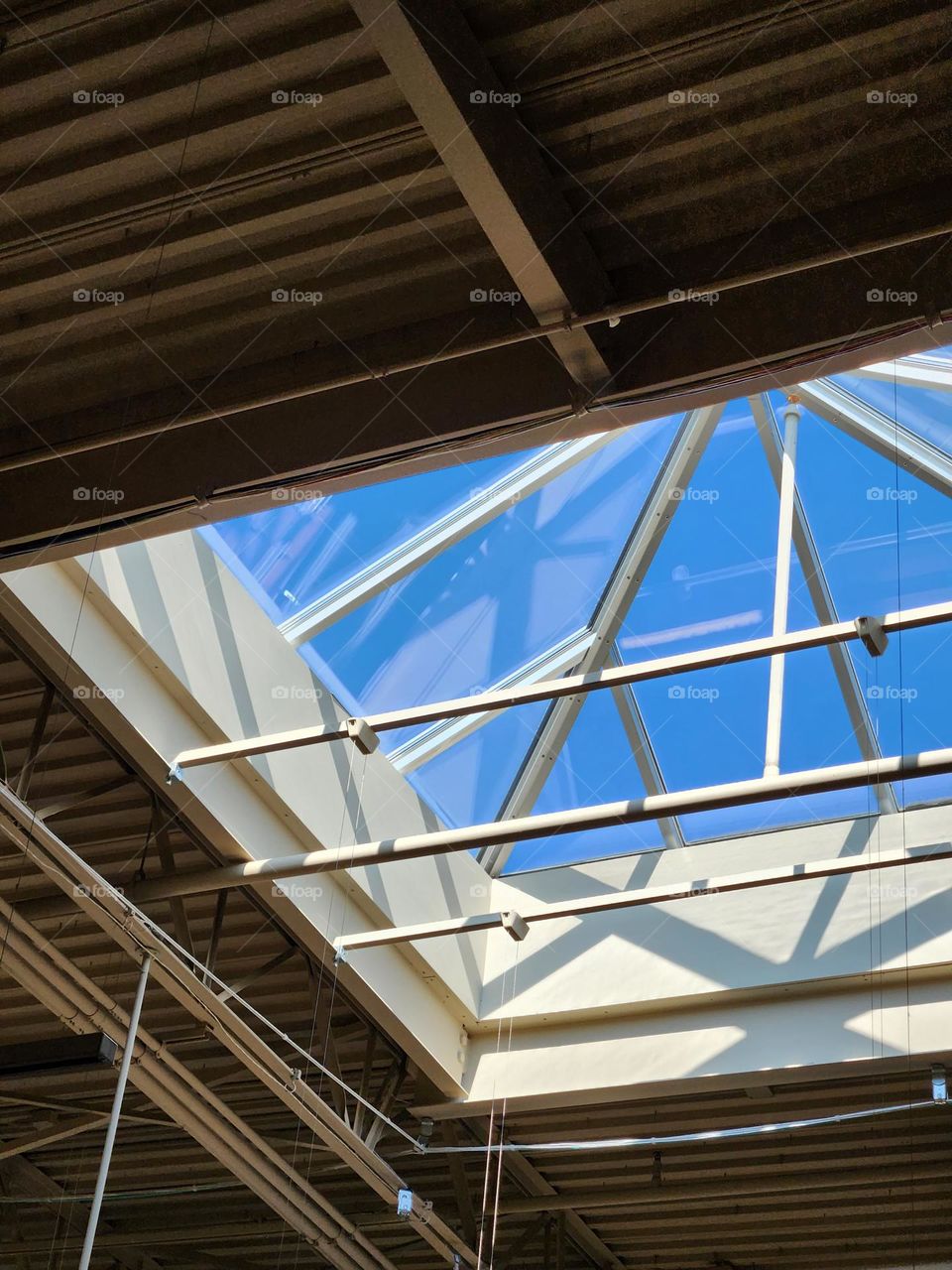 skylight showing blue sky in a suburban market