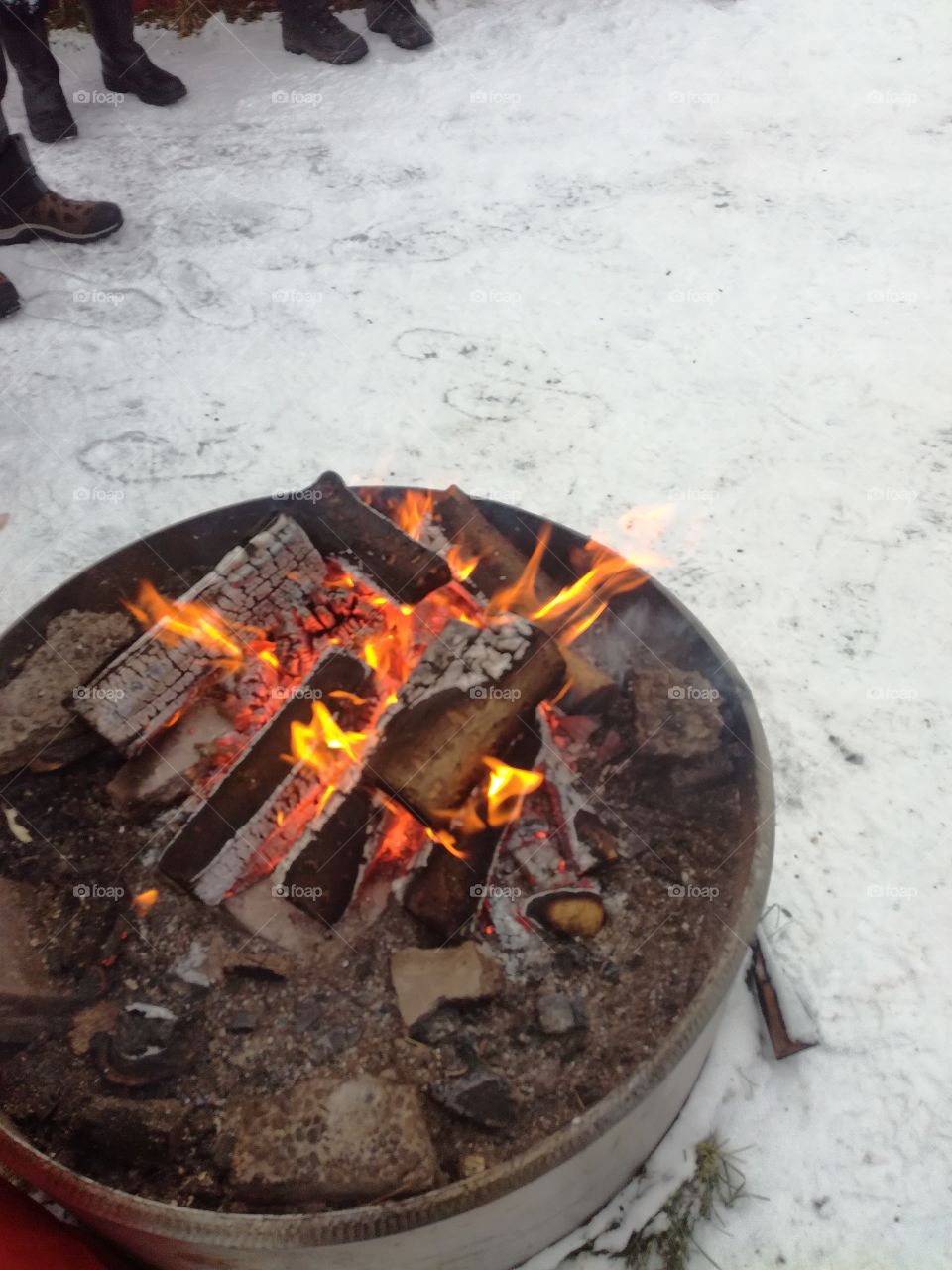 Fireplace outside in snow