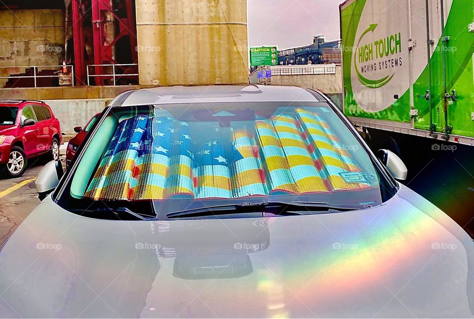 Just today on January 3rd, 2022, the numbers of the new year still a bit awkward to me I saw a white car parked beneath the Pulaski Bridge with a metallic starspangled blowup pillow stuffed in its rear window. Hypnotic Productions