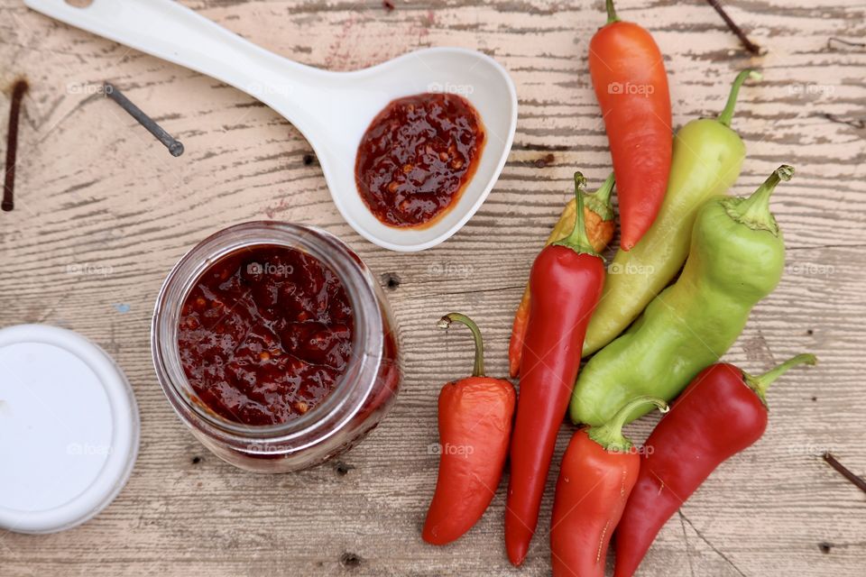 Flat lay food canning preserving, rustic farm fresh peppers