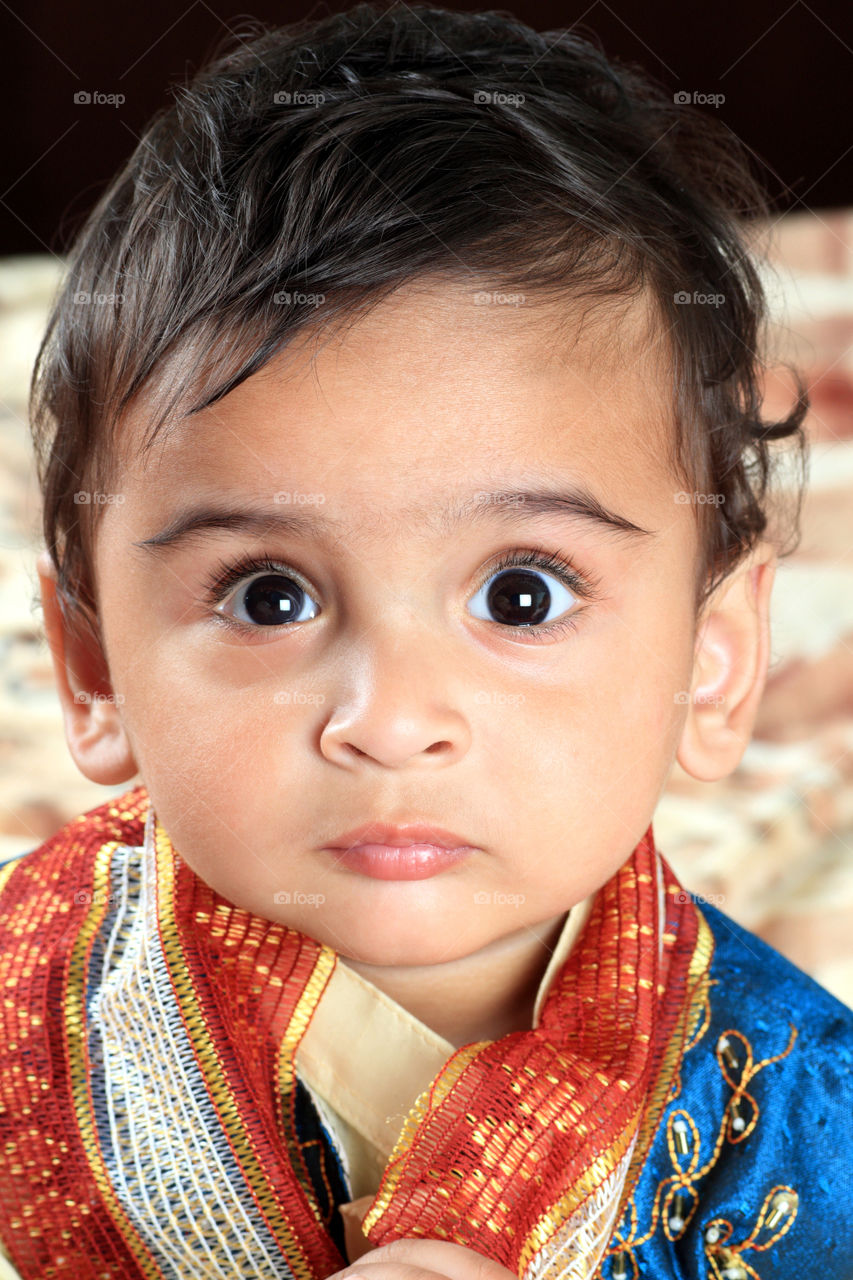 Toddler Indian boy in traditional clothes