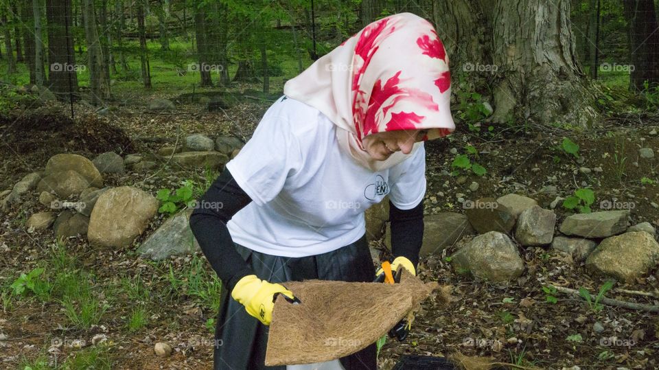 Woman volunteers at local farm 