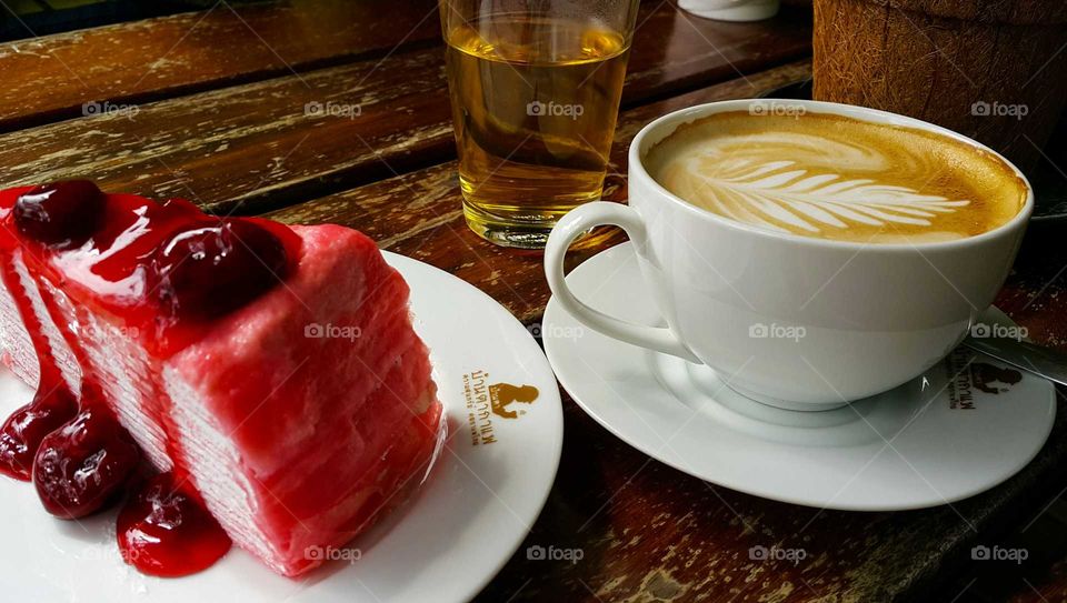 strawburry crepe cake and hot coffee in morning