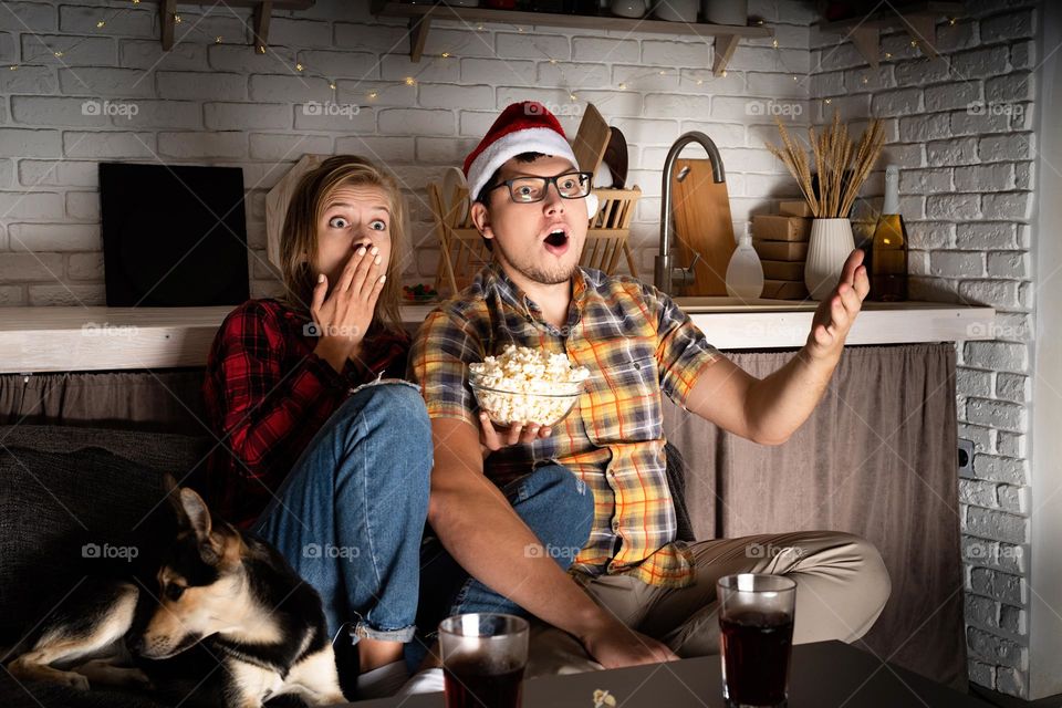 young couple watching movies