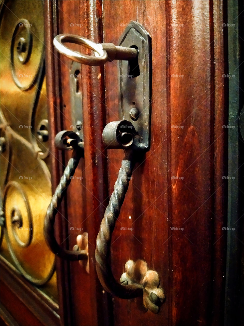The key in the lock of the old cabinet