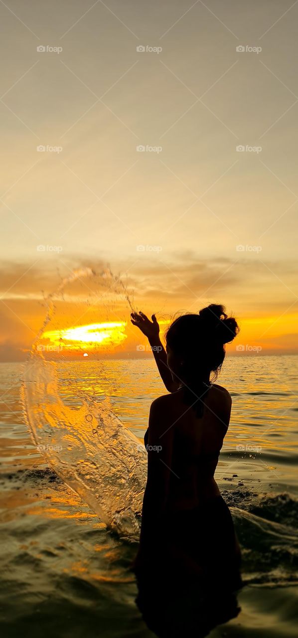 Silhouetted by the sunset