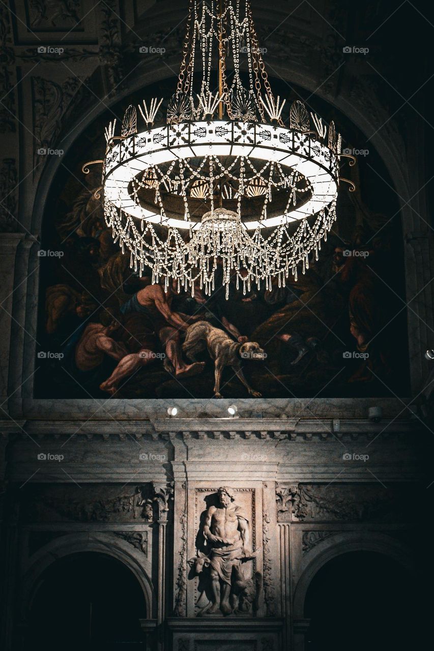 Europe-style interior with crystal light and statue