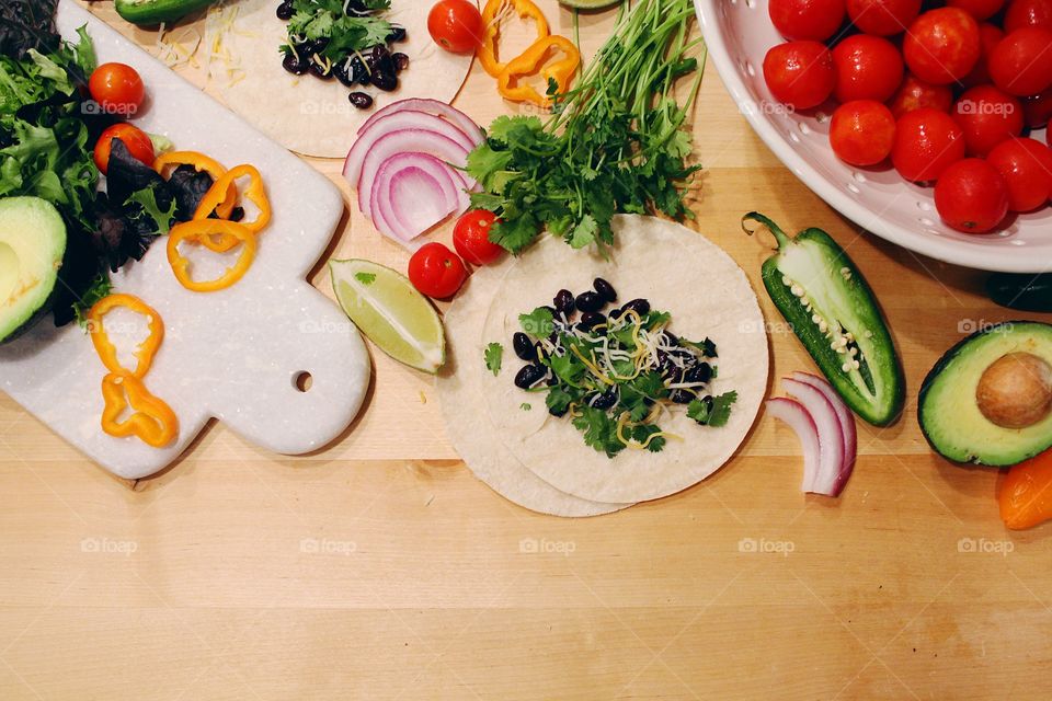 Fiesta inspired meal preparation with fresh produce.