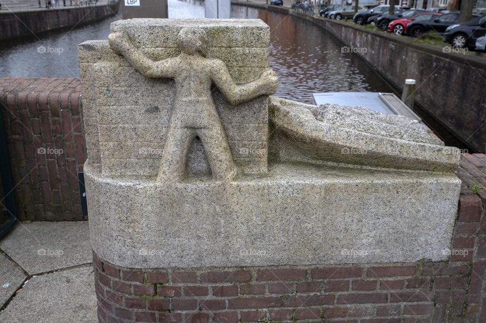 Statue On The Overtoomse Sluice Bridge At Amsterdam The Netherlands 29-3-2023