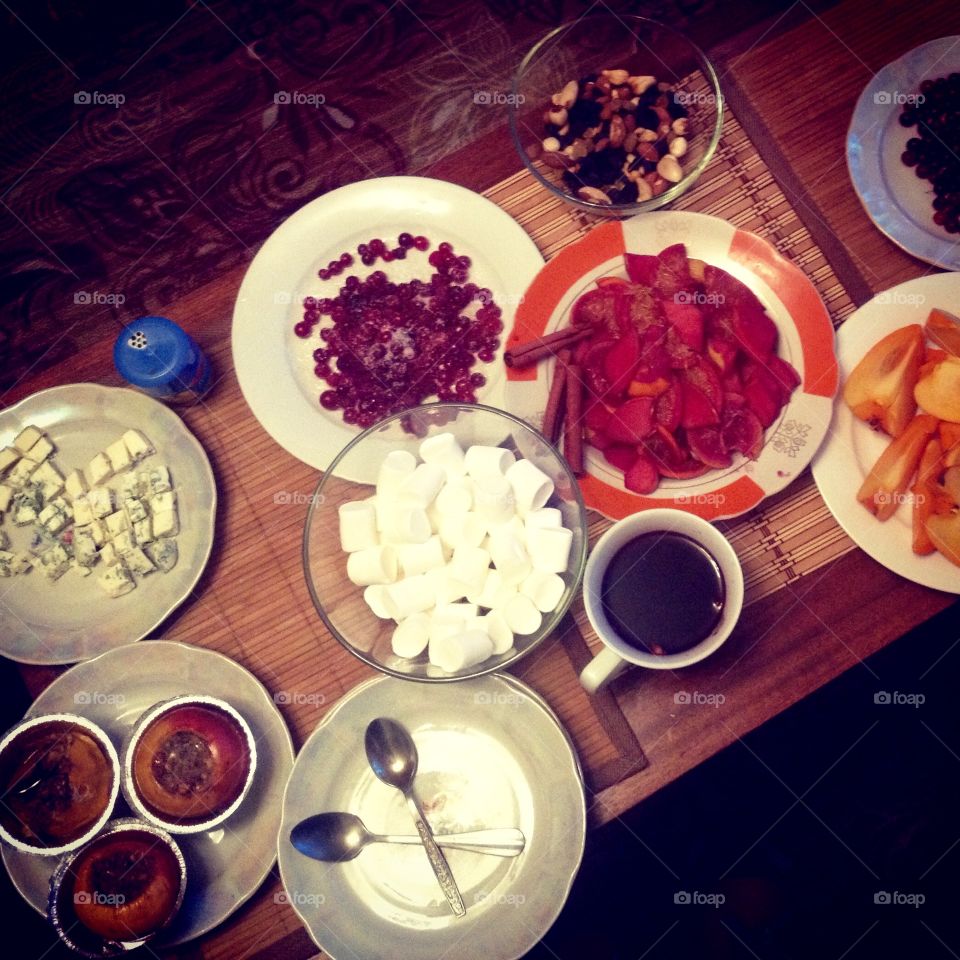 Homemade dishes for a girls party on a stand from above