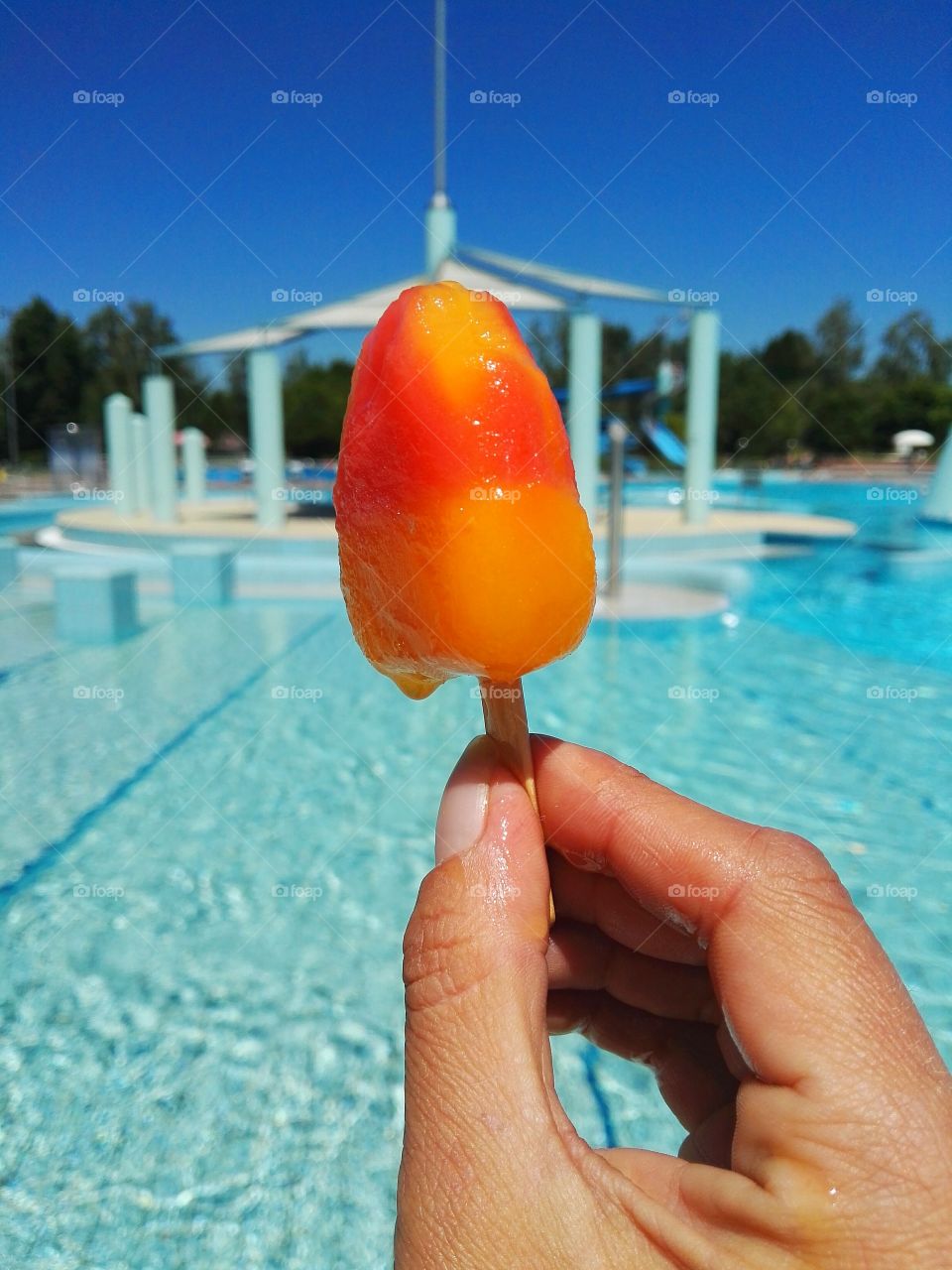 Eating ice cream at the pool on a hot summer day