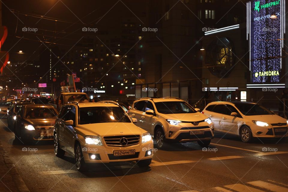 Busy street with cars in the evening