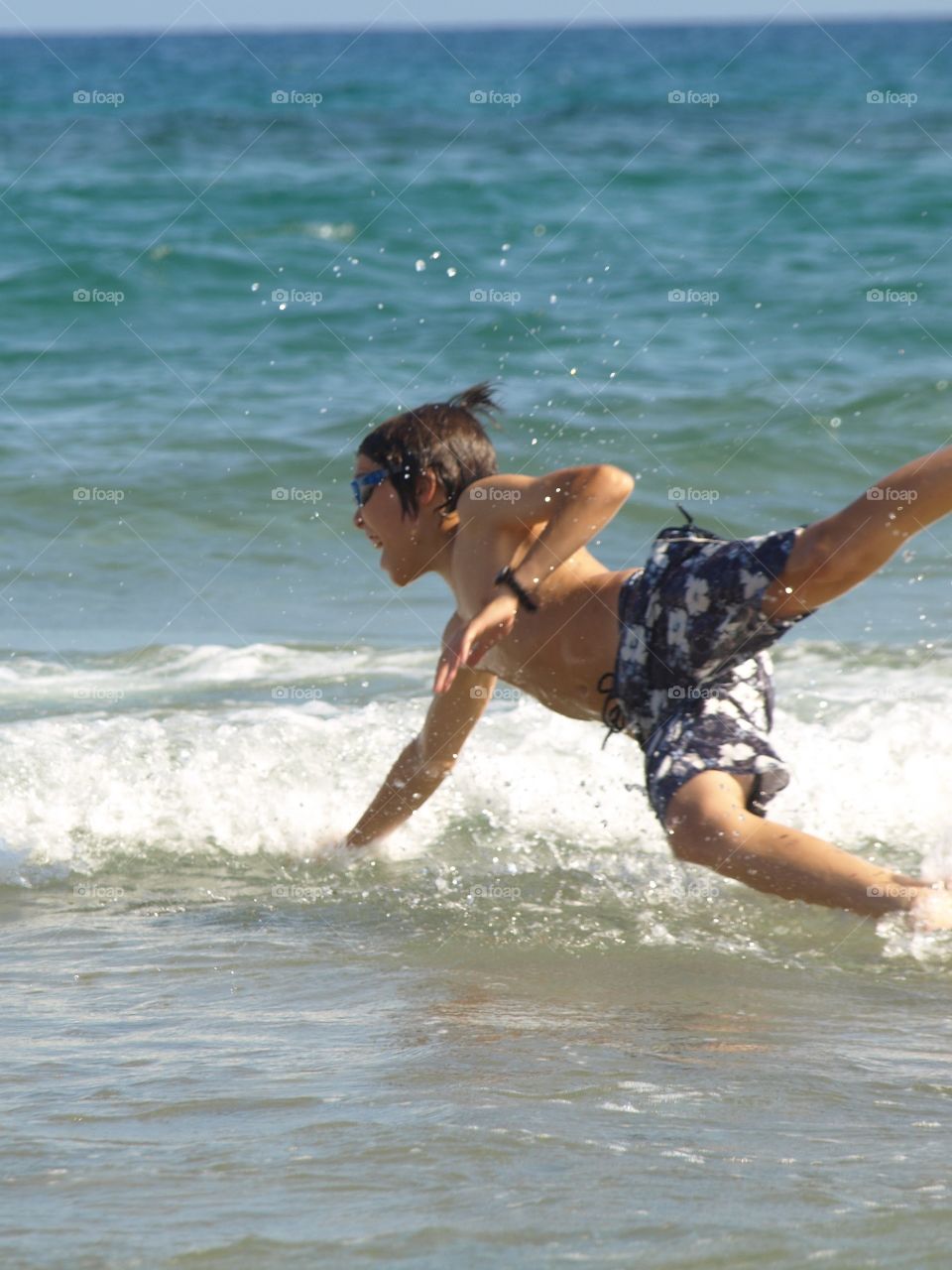 Boy enjoying in the sea