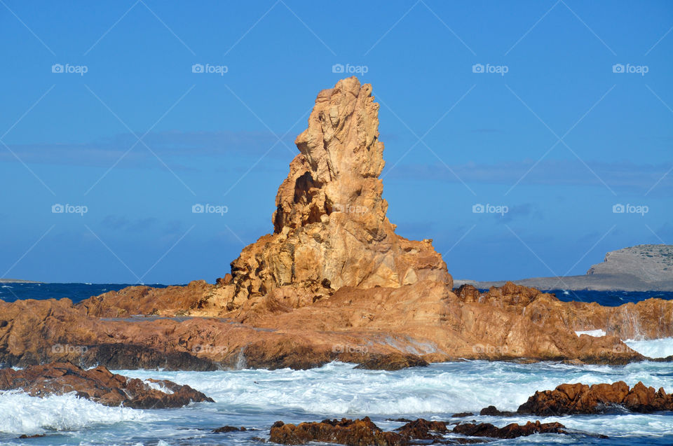 cliffs on the beach of menorca Balearic island in Spain