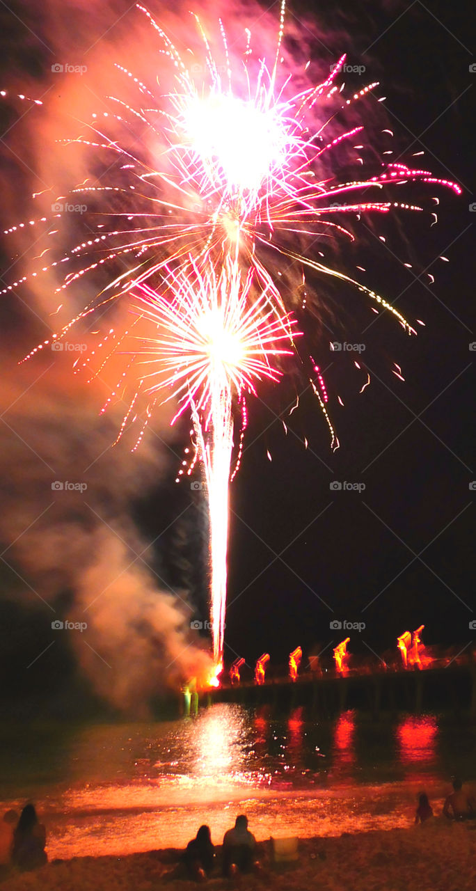 Firework at night at beach