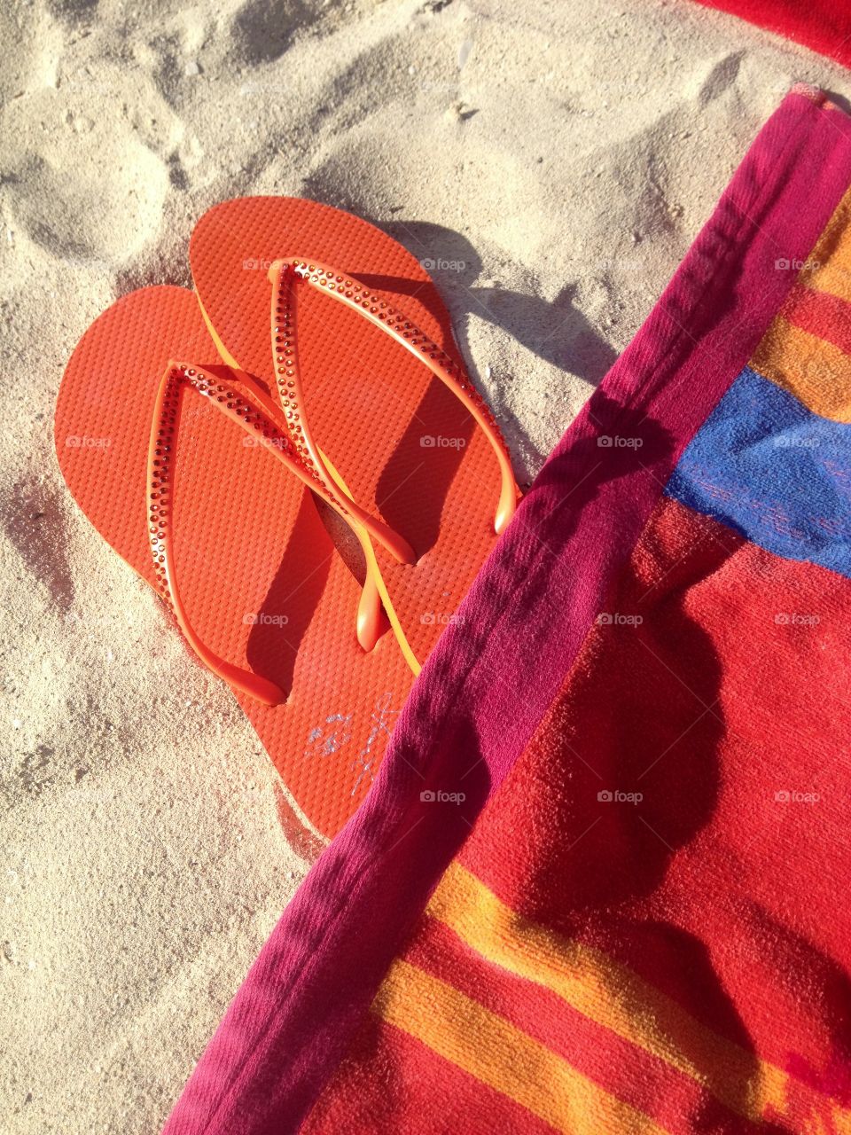 Flip flops on the beach. 