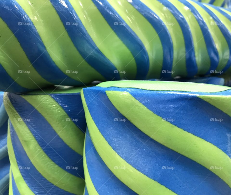 Green pool noodle floats 