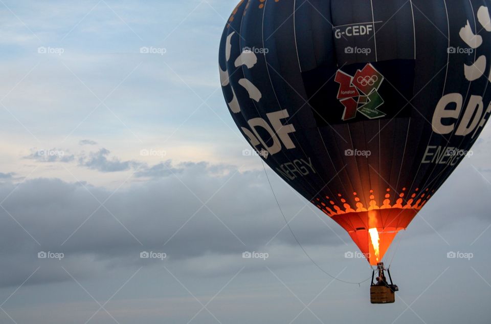 Hot air balloon at dusk over the city of Bath, Somerset (UK)