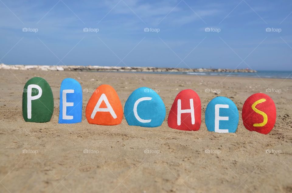 Peaches, female name on colourful stones