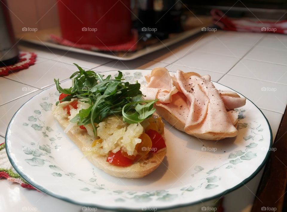 Turkey arugula tomato sandwich