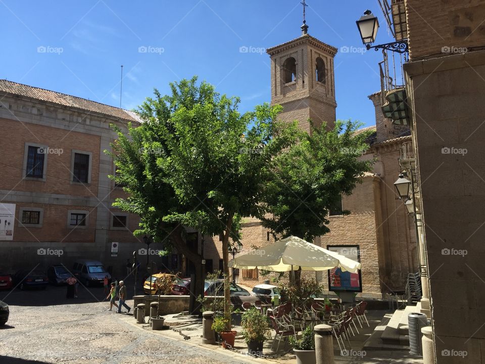 Outdoors restaurant on a plaza in Toledo Spain