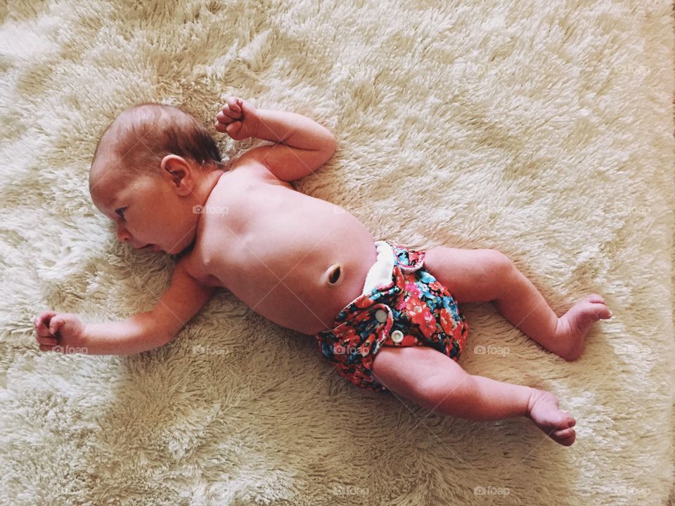 Newborn in cloth diaper
