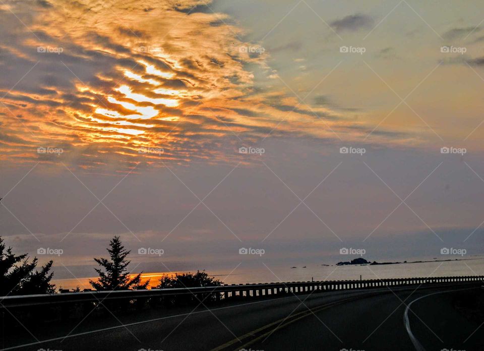 Gorgeous Sunset Peeking Through the Clouds "Always Take a Back road"