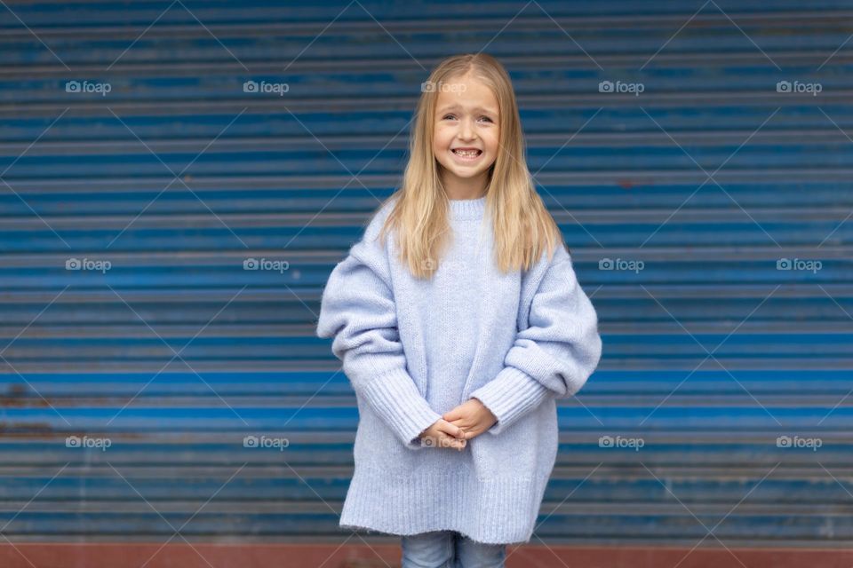 Portrait of little Caucasian girl feeling fear