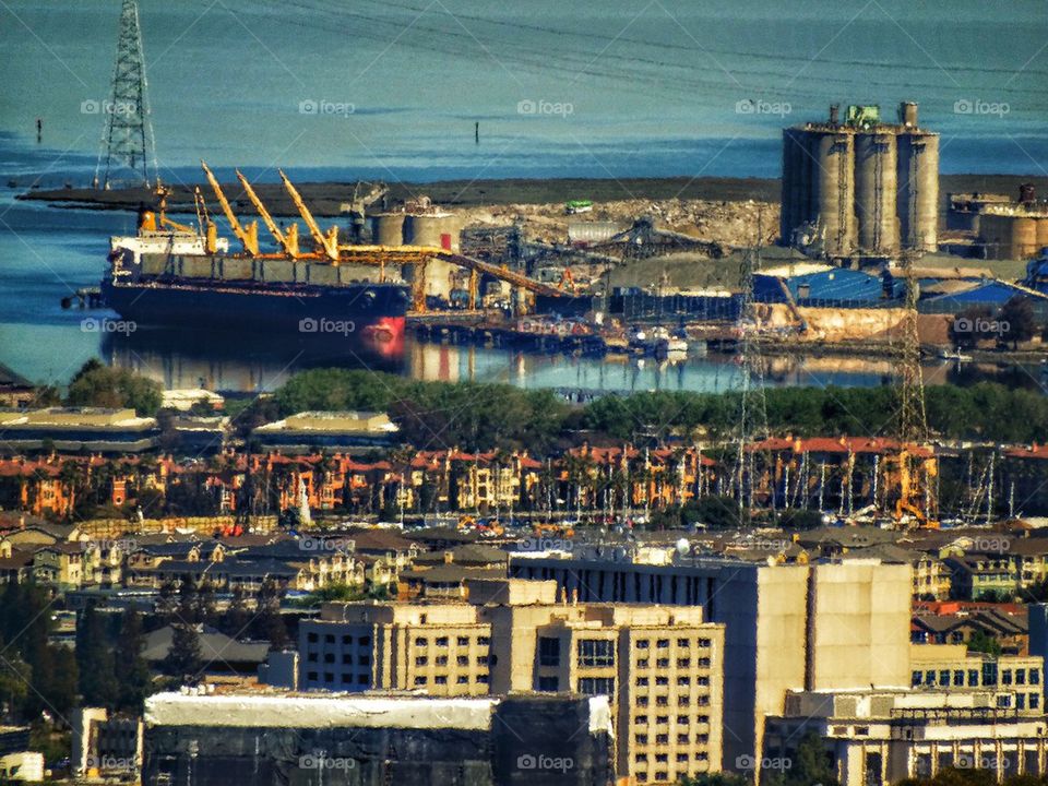 Cargo ship loading at port