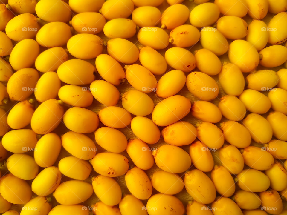 Close up full frame macro photo of neem fruits