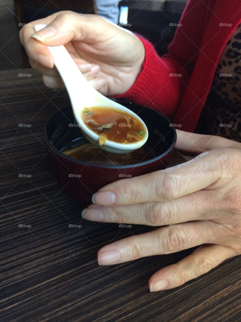 Holding hot & sour soup 