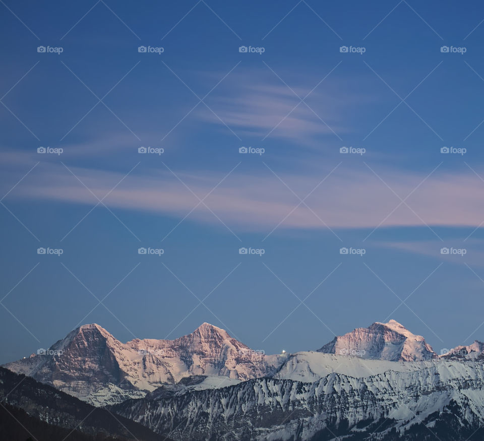 Mountain range (eiger, mönch & jungfrau) at sunset.