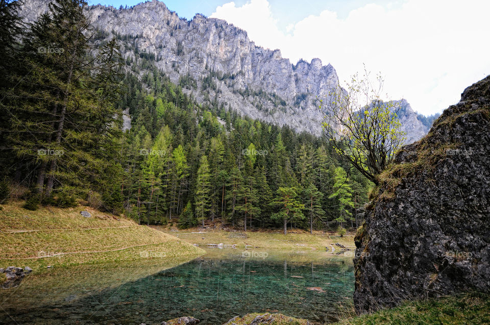 Hiking around the green lake at styria, austria