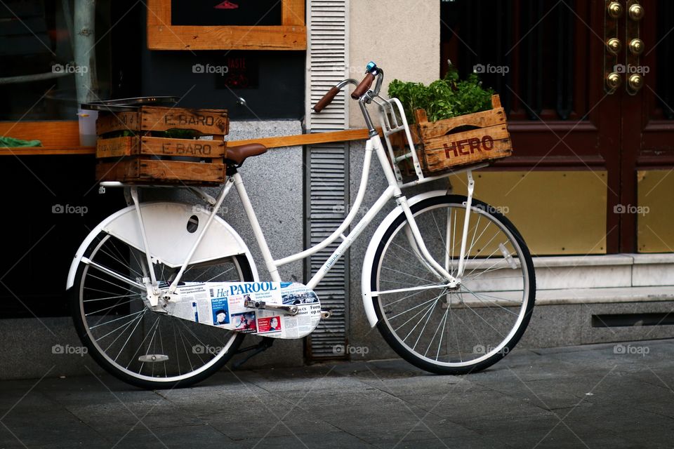 Old time bicycle. Old city bike on the side of a street