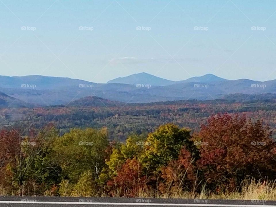 View of mountain range and autumn trees