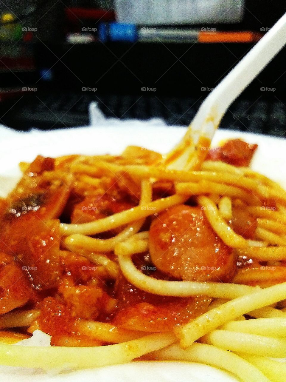 Spaghetti is a long, thin, solid, cylindrical pasta. Spaghettoni is a thicker form of spaghetti, while capellini is a very thin spaghetti. It is a staple food of traditional Italian cuisine.