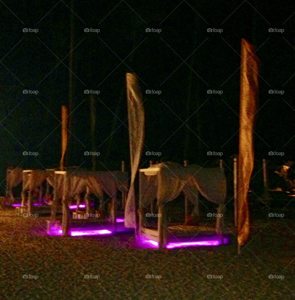 Beds on the beach at night/ Punta Cana