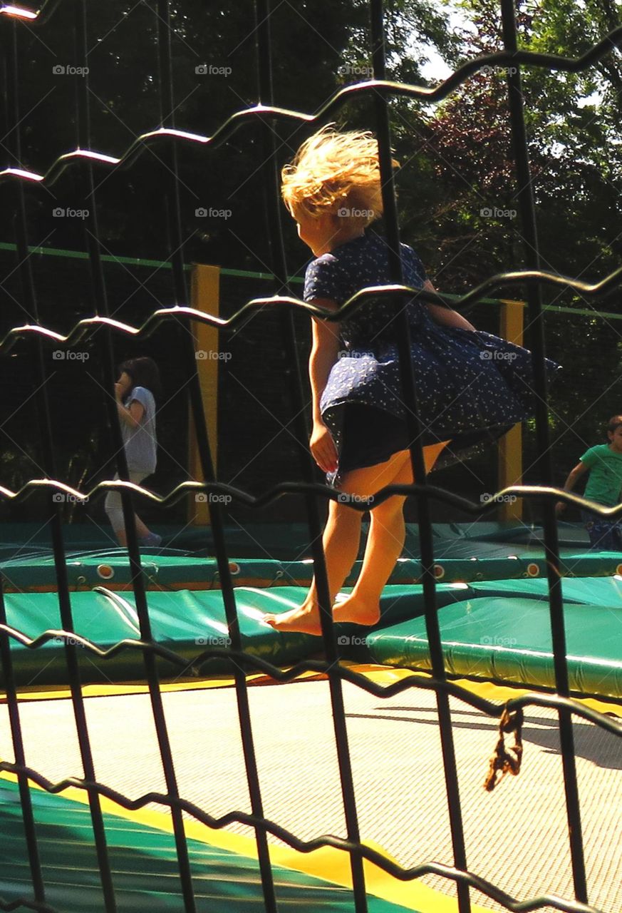 jumping on a trampoline