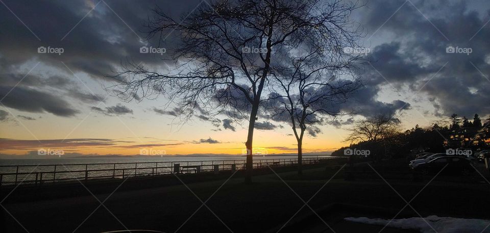 Sunset view at the beach .blue skies and clouds